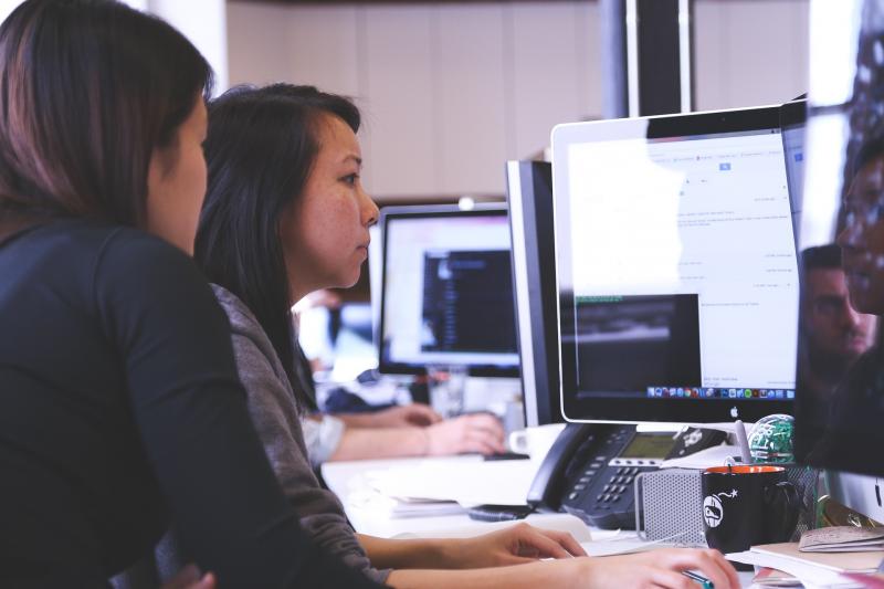 Women working at a computer